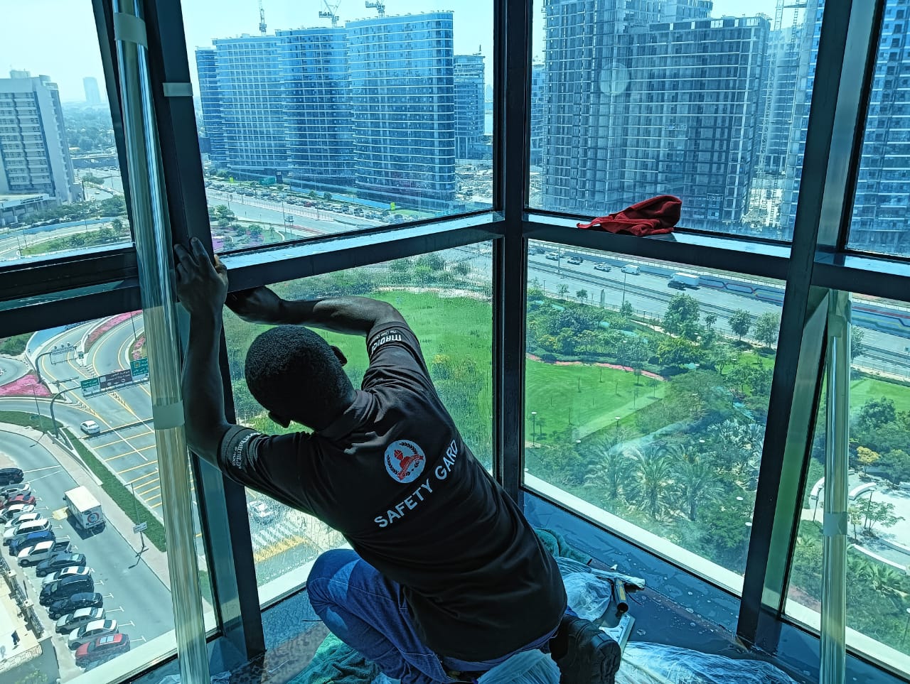 Installer applying safety film